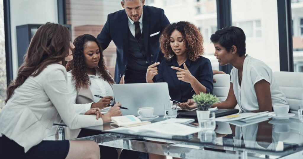 people having a discussion in conference room