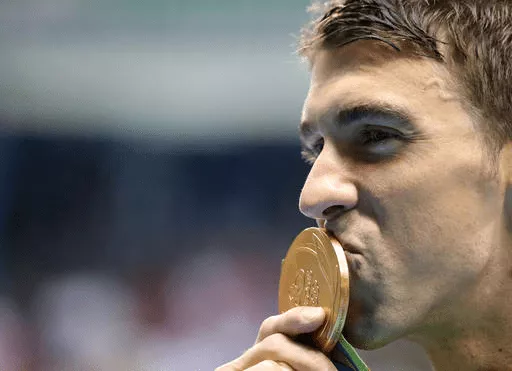 The Body Language of Kissing: Why We Kiss, Types of Kissing and How to Kiss 3 man kissing his medal