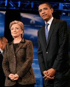 What is Defensive Body Language? 3 Obama and Clinton hands are crossed over the genitals