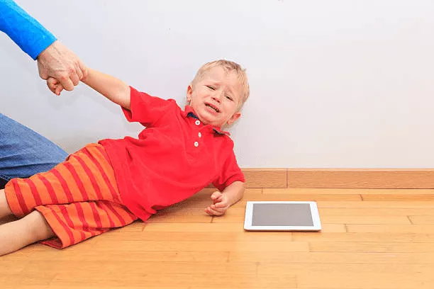 Holding Hands: Just Friends or More? 4 Child being dragged away from gadget